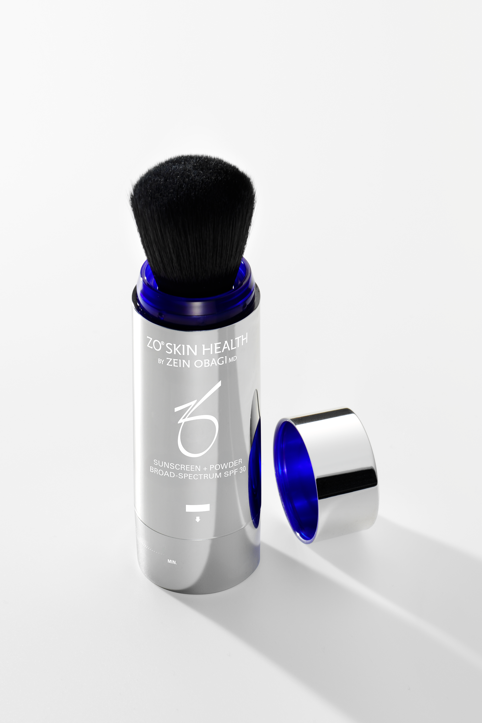 CRÈME SOLAIRE + POUDRE FPS 30 À LARGE SPECTRE